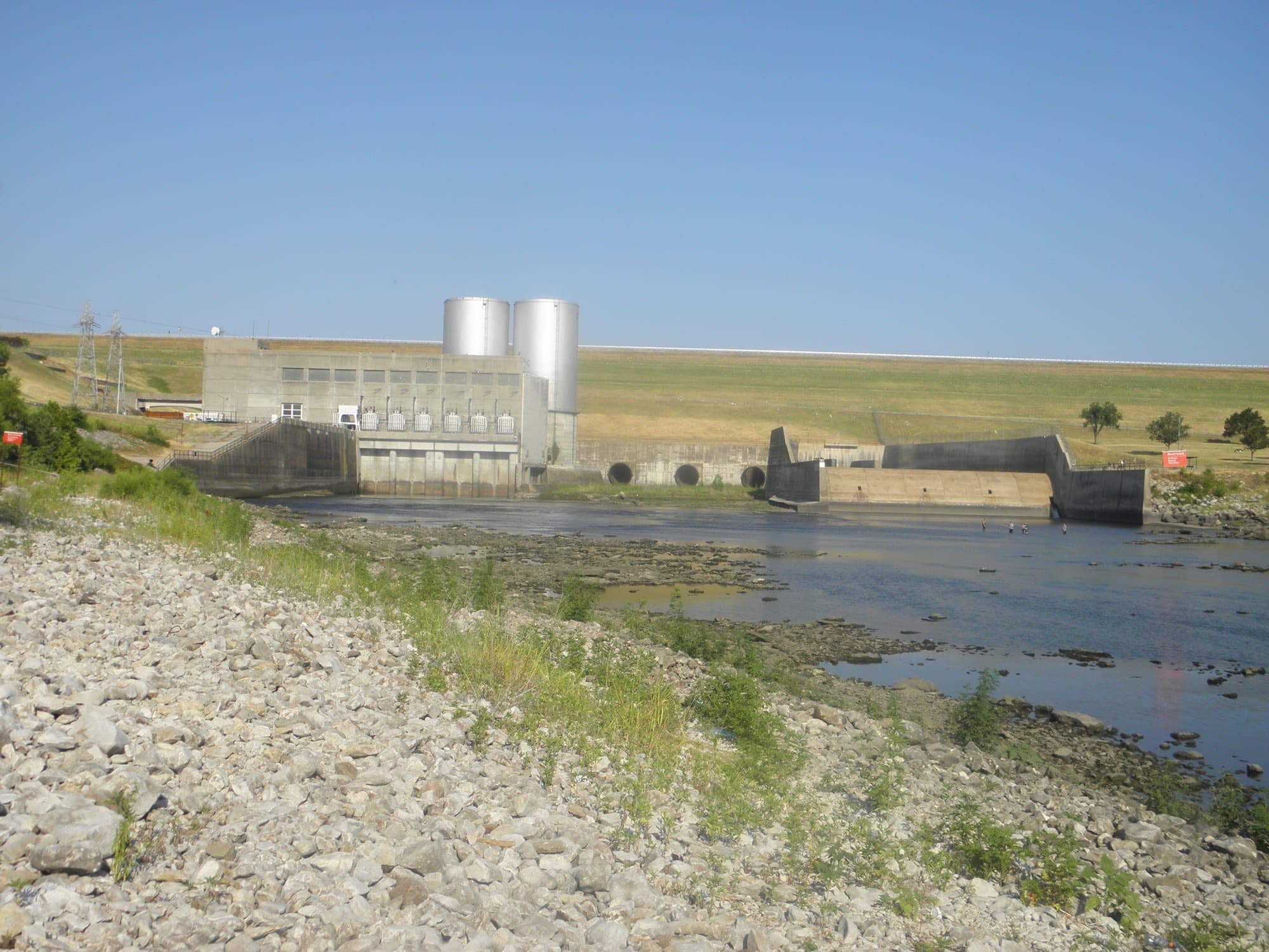 Denison Dam and its powerhouse on the Red River, the rolled earth-fill dam that impounded Lake Texoma in 1944